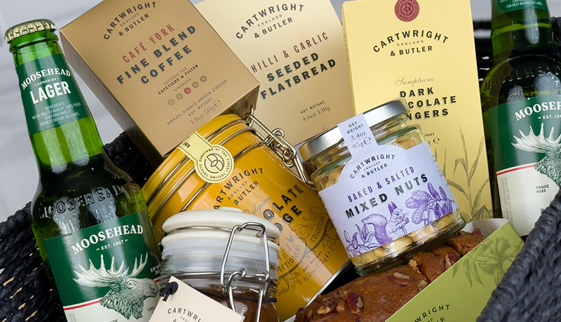 Beer and cider hamper with craft beverages and gourmet snacks